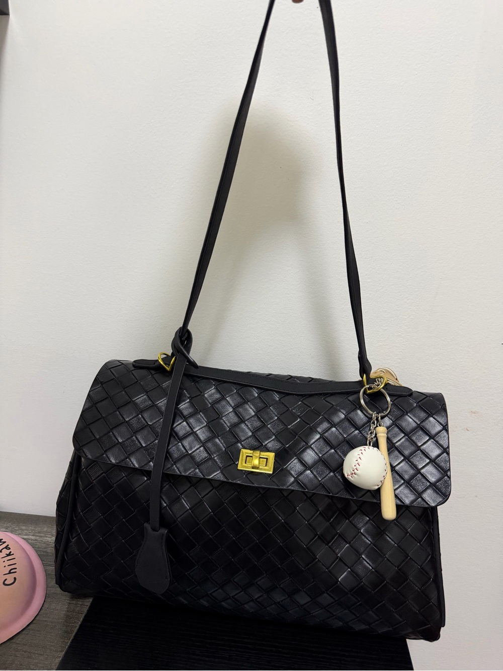 Woven Black Leather Shoulder Bag with Gold Accent